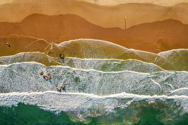 Beach, sand, sea, waves and coastline in Australia, aerial view
