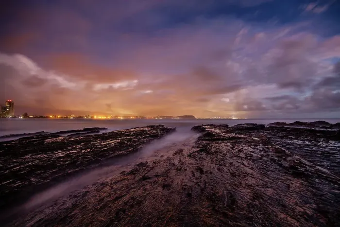 Framed Print : Beautiful twilights cloudy sunset over the textured rocks at Currumbin alley Framed Print : Beautiful twilights cloudy sunset over the textured rocks at Currumbin alley