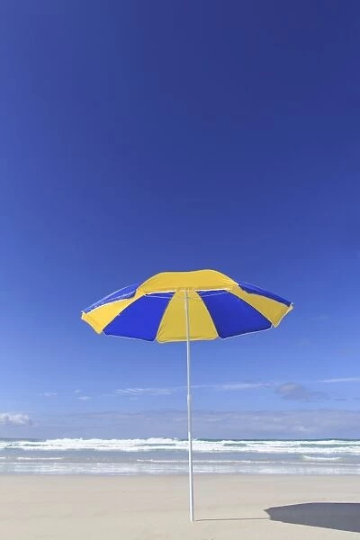 Blue and yellow beach umbrella