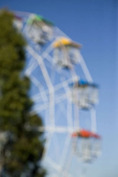 Blurred view of a ferris wheel