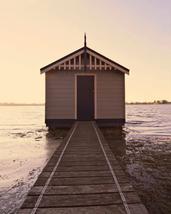 Framed Print : Boatshed on lake