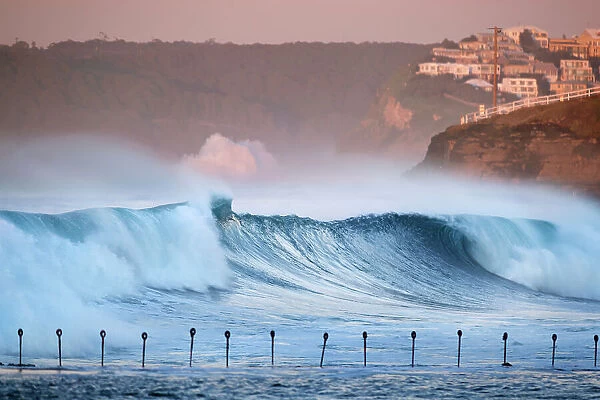 breaking wave on east coast of australia at dawn