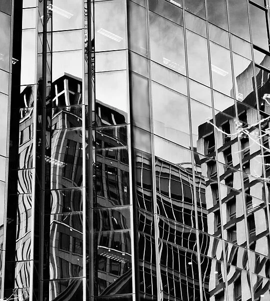 Building reflections on a high rise building