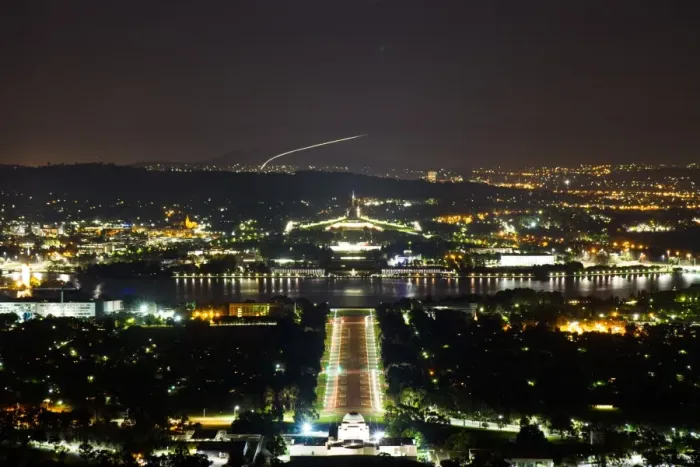 Framed Print : Capitols. Australian parliament at night as shot from a nearby mountain hill