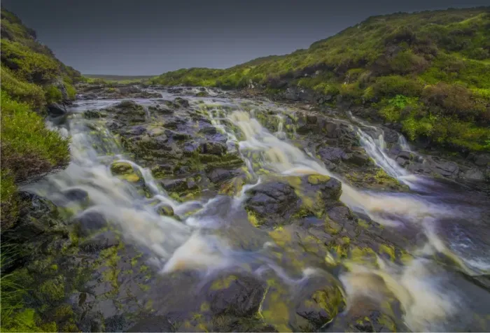 Framed Print : Cascading water in the mountainous region of the Cuillins, Isle of Skye, Scotland, the United Kingdom