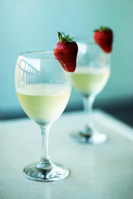 Framed Print : Cheers. Wine glasses with strawberries