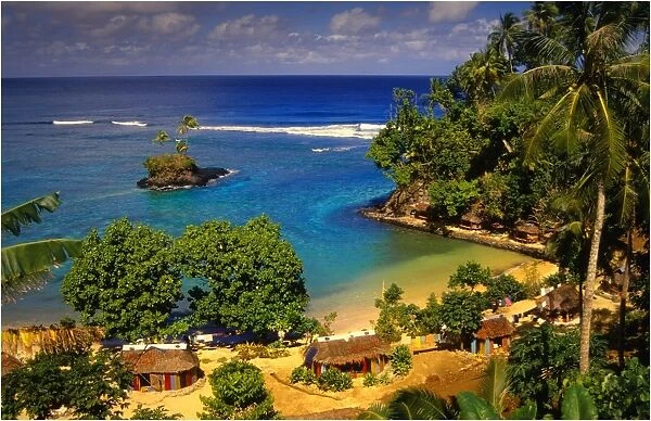 Cluster of tourist beach huts, The Island of Upolu, Western Samoa