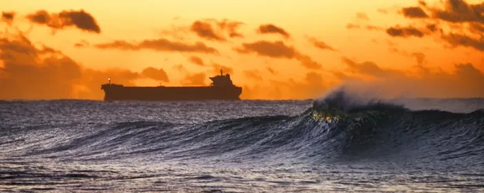 Framed Print : coal ship entering port with wave in foreground Framed Print : coal ship entering port with wave in foreground