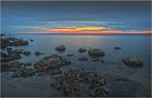 The coastline of Port Phillip bay at dusk near Beaumaris, Melbourne, Victoria