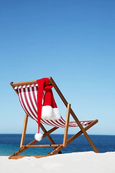 Deck Chair with Santa hat. Christmas. Australia