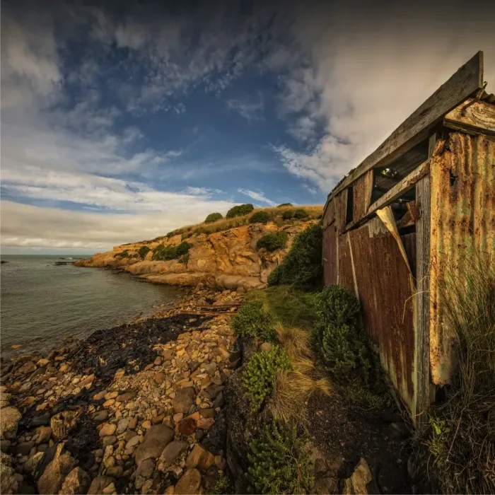 Framed Print : Derelict boat-shed on the coastline at Hillgrove, New Zealand, south island