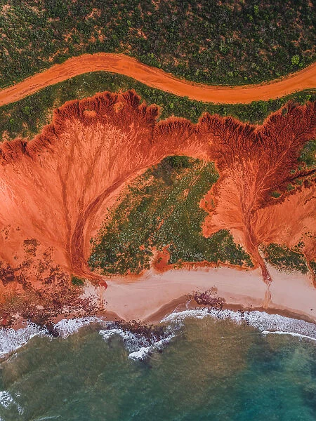 Dirt road and rock formations photographed from above, James Price Point, Australia