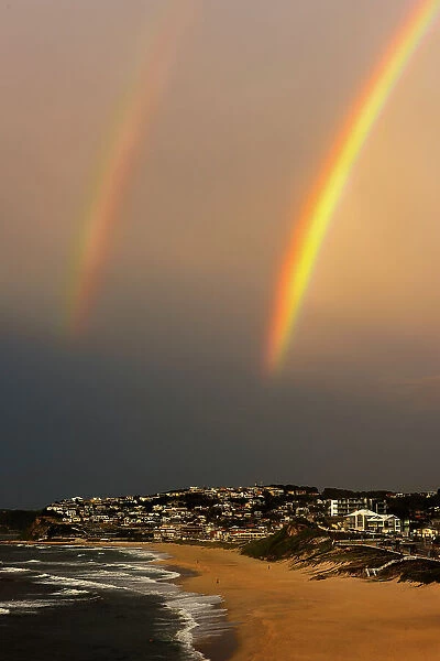 double rainbow over beach after a storm passed through