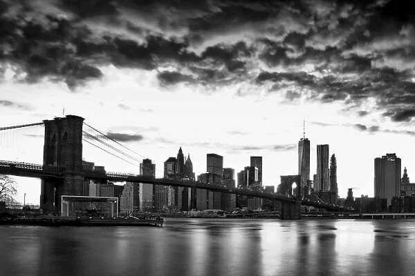 Dramatic clouds over the Manhattan skyline in black and white