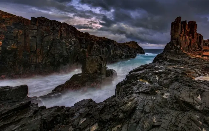 Framed Print : Dramatic rocky seascape sunset