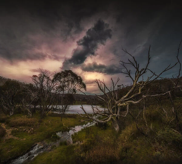 Dramatic storm clouds pass over the landscape in the Kosciuszko National Park