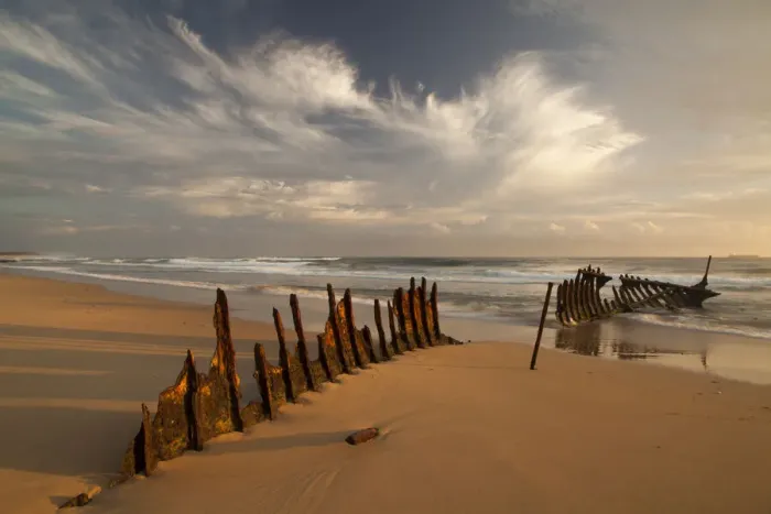 Framed Print : A dramatic sunrise on Dicky Beach with the wreck of the SS Dicky in the foreground Framed Print : A dramatic sunrise on Dicky Beach with the wreck of the SS Dicky in the foreground
