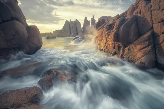Framed Print : Dramatic view of crashing waves, ocean, rocks and rocky coastline at sunset in Victoria, Australia Framed Print : Dramatic view of crashing waves, ocean, rocks and rocky coastline at sunset in Victoria, Australia
