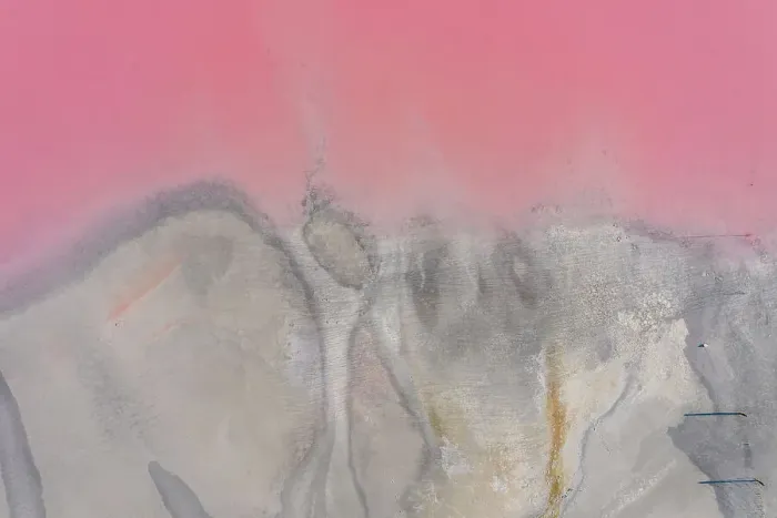 Framed Print : Drone view point of the pink shades of color, patterns and textures over Pink Lake waters with dark salty sandy soil Framed Print : Drone view point of the pink shades of color, patterns and textures over Pink Lake waters with dark salty sandy soil