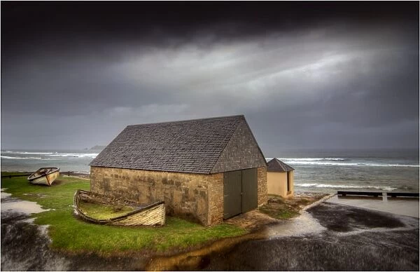 An early spring storm whips along the coastline of Sydney bay, Norfolk Island