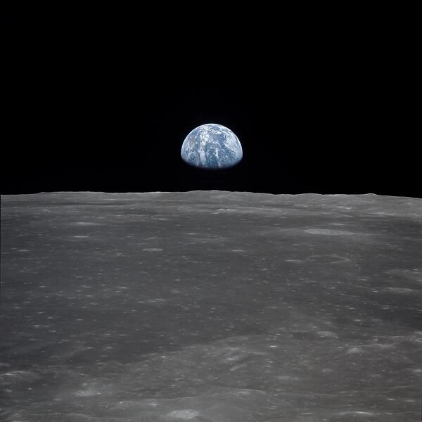 Earth Rising Above the Moons Horizon