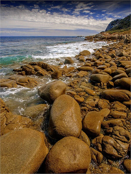 Egg Beach, named because of the wonderful egg shaped rocks, smoothed by the constant tides. Flinders Island, Bass Strait, Tasmania