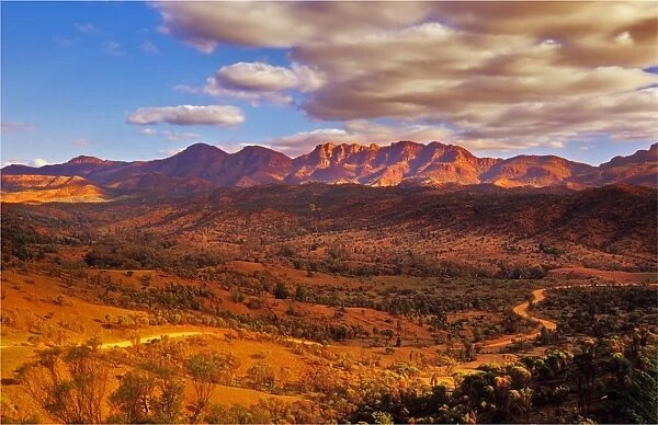 An elevated view, showing the gravel road winding its way through the Bunaroo Valley, Flinders ranges national park, South Australia