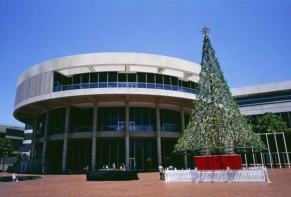 Exterior of Sydney Convention Center with Christmas tree