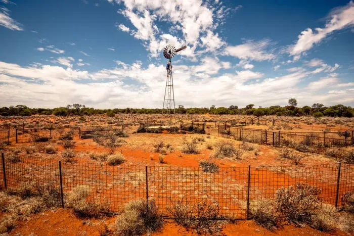 Framed Print : Fixing the windmill in Australian Outback Framed Print : Fixing the windmill in Australian Outback