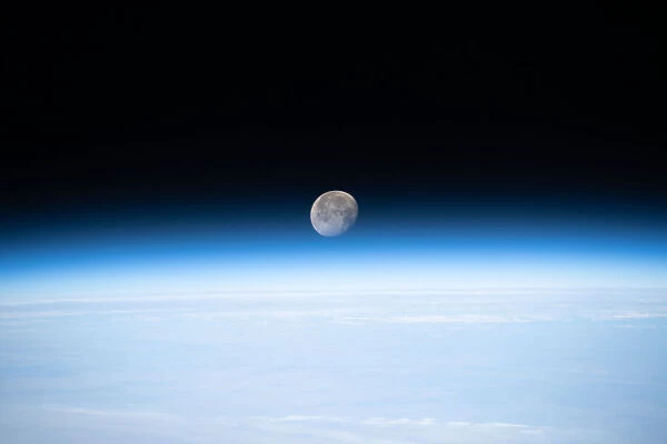 Gibbous Moon just above Earths horizon