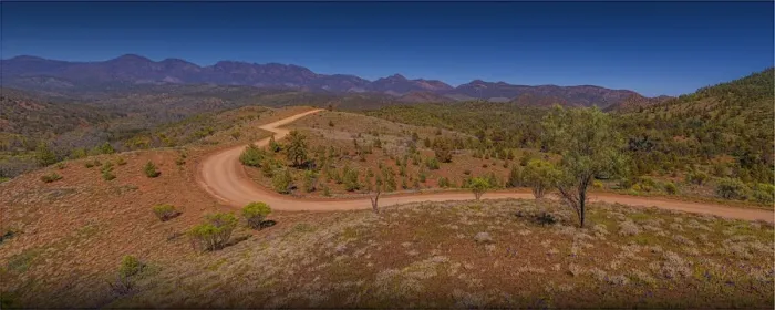 Framed Print : The gravel road winds through the Bunyeroo Valey in the Flinders Ranges national park, South Australia