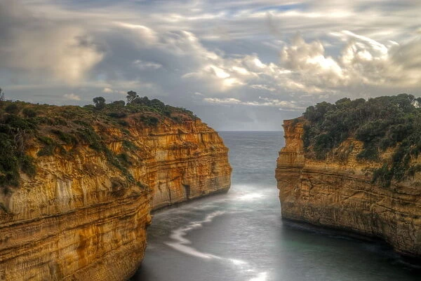 Great Ocean Road Limestone Cliffs and bay sunset