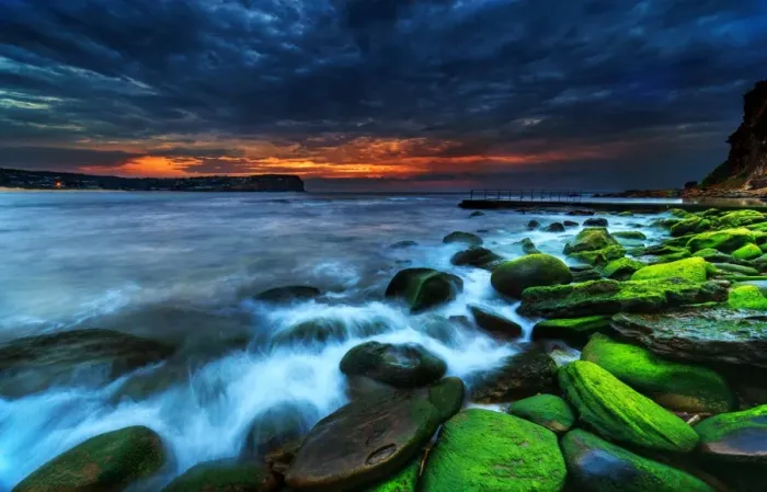 Framed Print : Green rocks moody sunrise