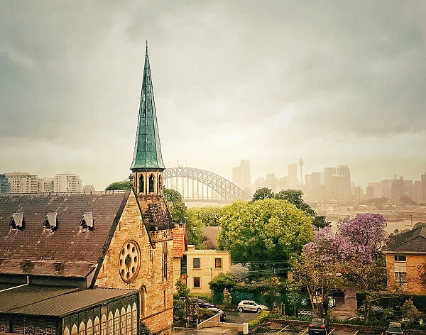 Harbour bridge and church on a cloudy day