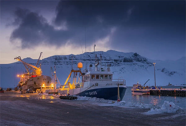 The harbour and ships loading and unloading goods, Grundarfjordur, northwest Iceland