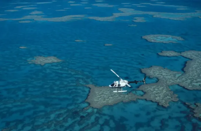 Framed Print : Helicopter over coral reef
