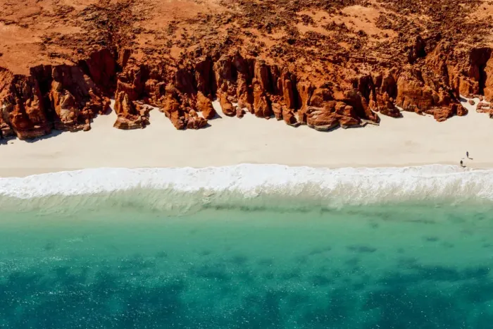Framed Print : A helicopter view of the white sands, turquoise ocean and striking red Kooljaman Cliffs at Cape Leveque in Western Australias north west