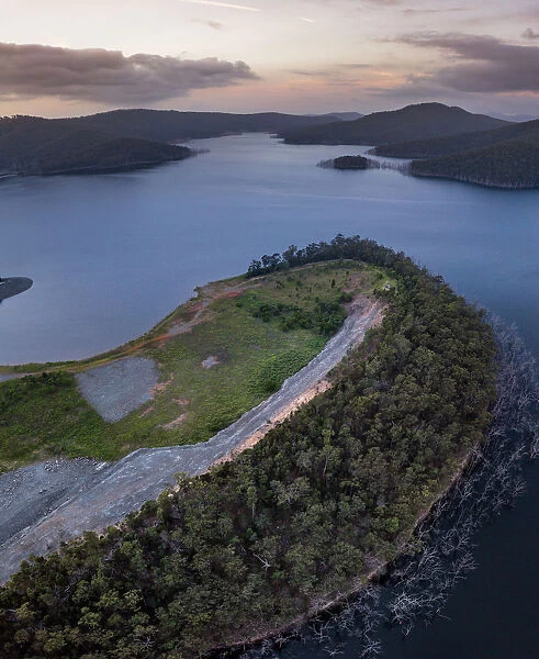 Hinze Dam. The Hinze Dam is a rock and earth-fill embankment dam with an