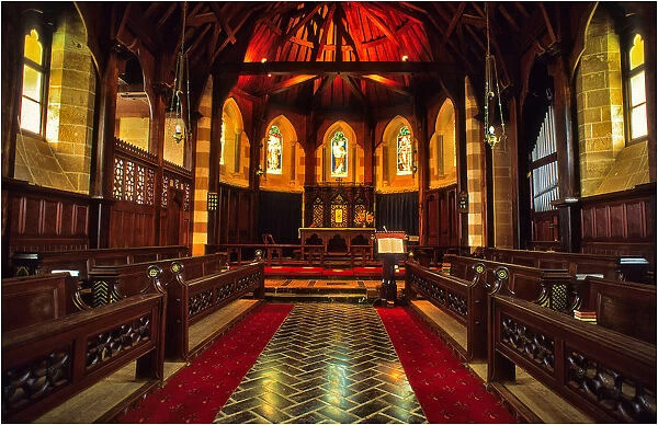 The historic Saint Barnabas Chapel interior, with its cedar timber-work and beautiful tiled floor, Norfolk Island