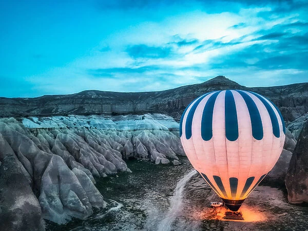 A hot air balloon is preparing to fly