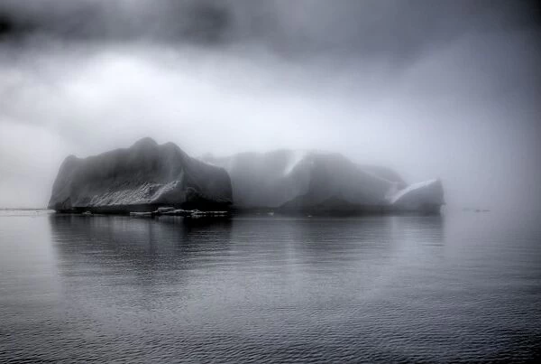 Huge Icebergs in mist
