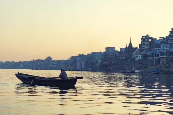 Framed Print : indian people rowing boat in Ganga river varanasi india