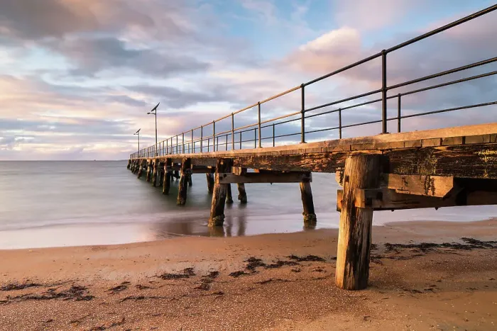 Framed Print : Jetty scene at sunrise in soft pastel tones
