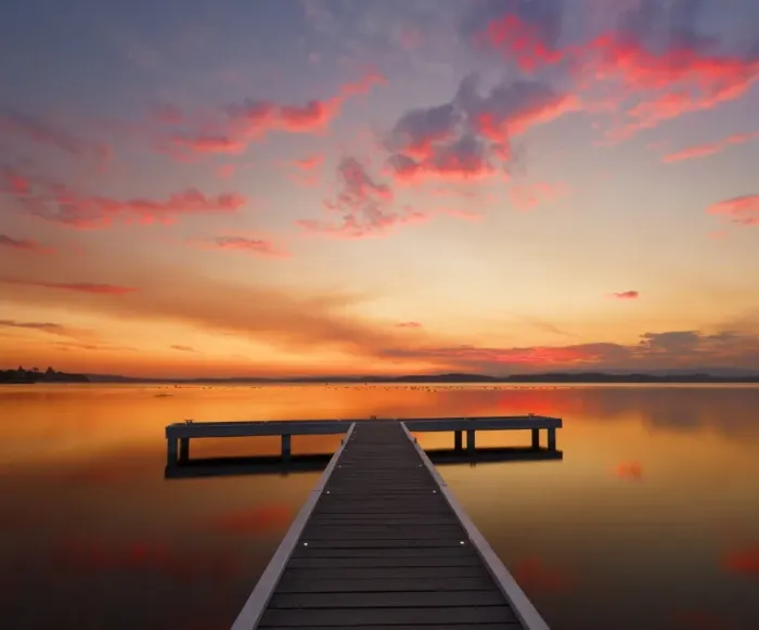 Framed Print : jetty with sunset at lake