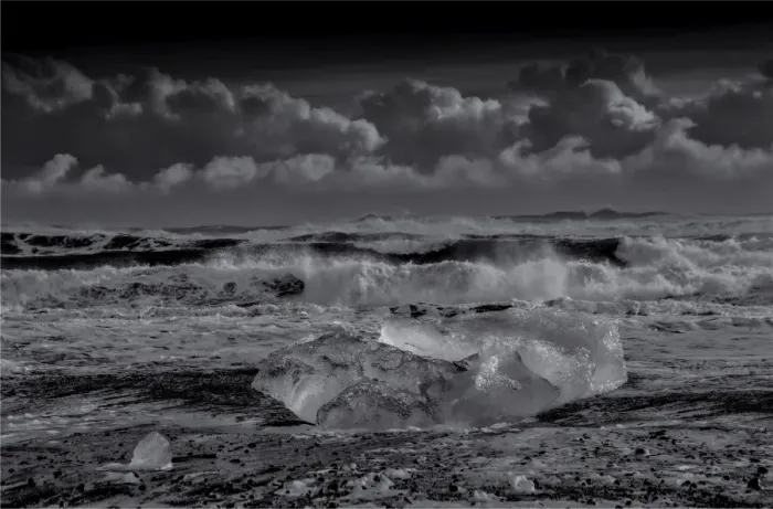 Framed Print : Jokulsarlon Beach in winter, just after a huge storm hit the coastline. Ice bergs from the nearby lagoon have been swept up onto the coastline and surge in and out with the tide Framed Print : Jokulsarlon Beach in winter, just after a huge storm hit the coastline. Ice bergs from the nearby lagoon have been swept up onto the coastline and surge in and out with the tide