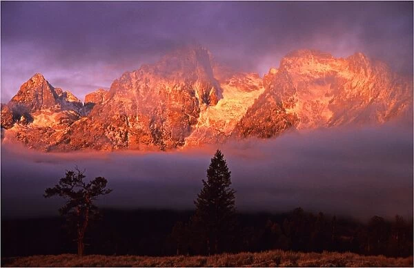 The kiss of dawn sunlight over the mountains in the Grand Teton National Park, Wyoming