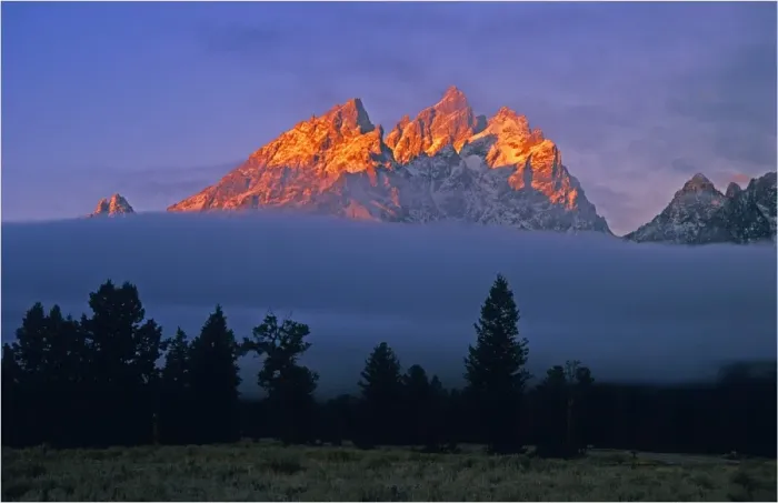 Framed Print : The kiss of dawn sunlight over the mountains in the Grand Teton National Park, Wyoming