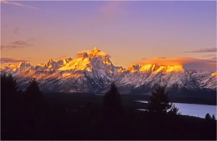 Framed Print : The kiss of dawn sunlight over the mountains in the Grand Teton National Park, Wyoming
