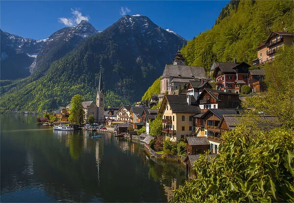 Lake Hallstatt and views of the beautiful historic village, in the mountainous region of Salzkammergut, Austria