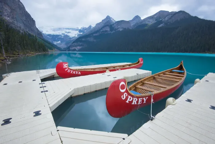 Framed Print : Lake louise with red Canoe